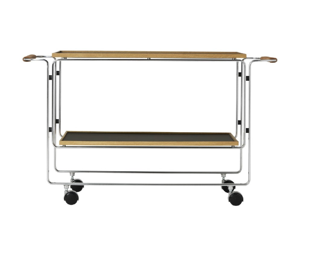 Chariot bar HB 128 par Horst Brüning, structure en acier chromé et plateaux en bois, design moderniste édité par Lange Production, présenté par Longitude Interior Design à Marseille. profil fond blanc