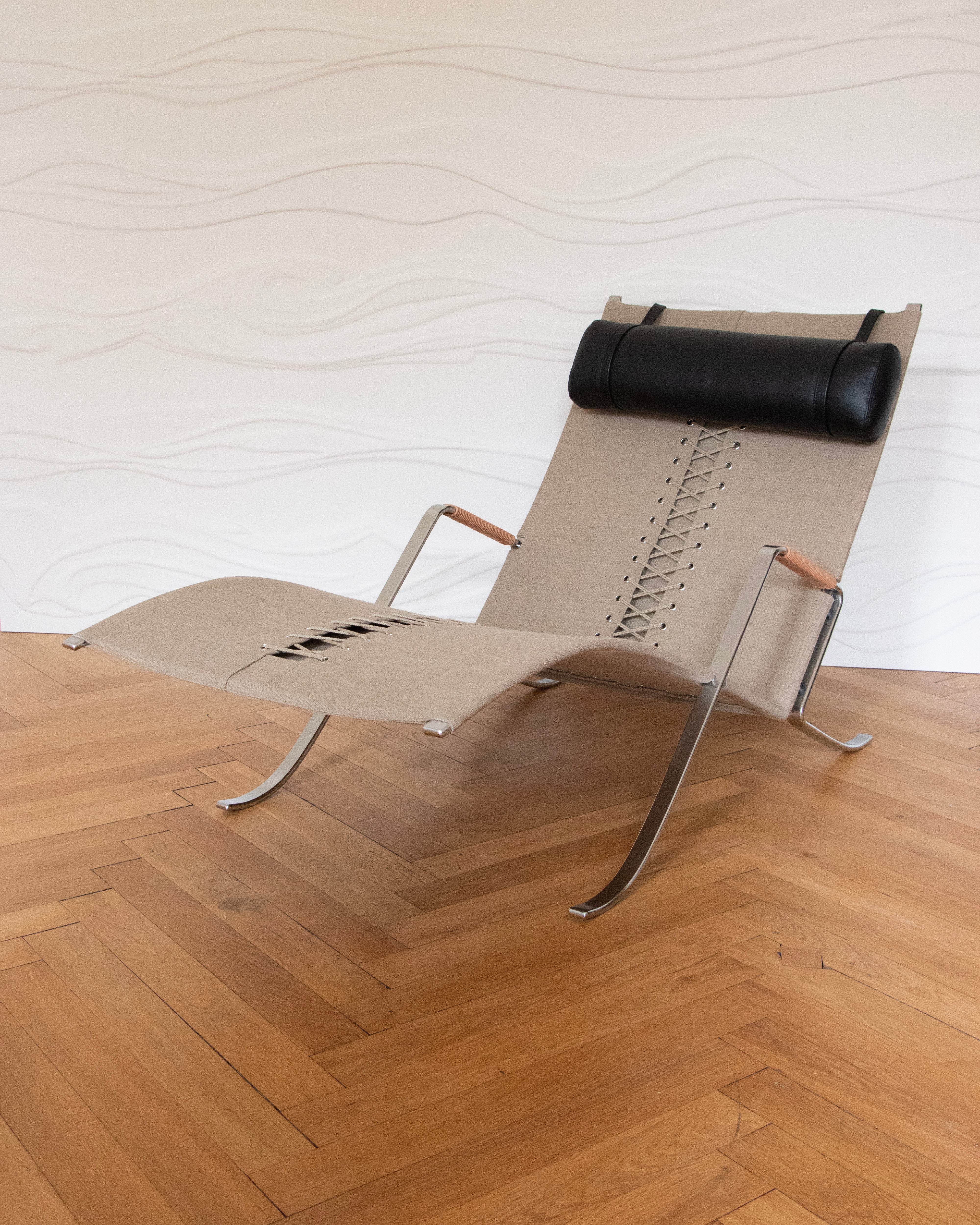 Chaise longue FK 87 Grasshopper Chair, icône du design par Preben Fabricius et Jørgen Kastholm : acier chromé et cuir.